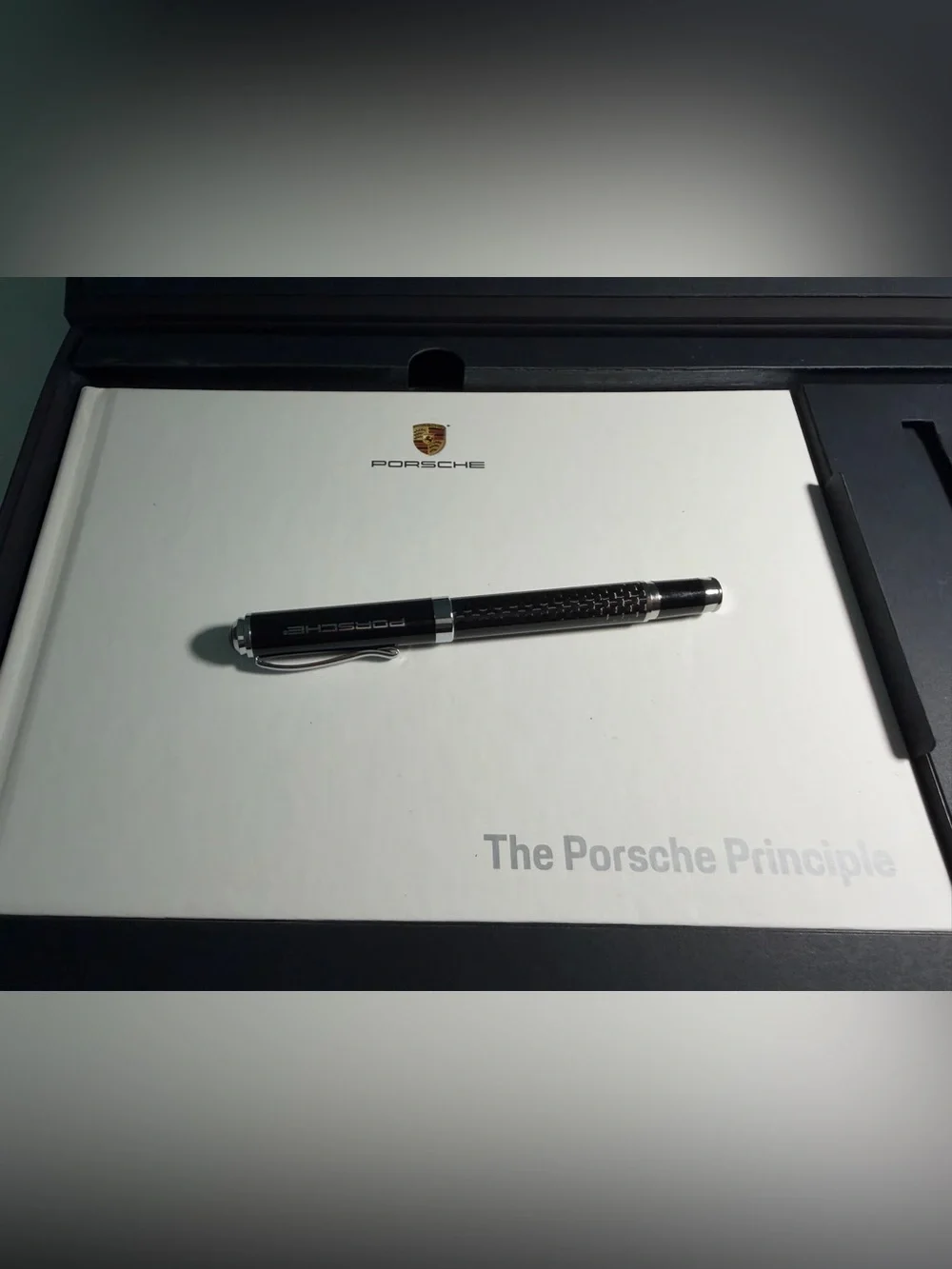 Porsche New Pen with book in box Case with Silver Logo.